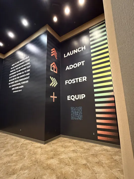 Hampton campus wall wrap installed: launch, adopt, foster, equip